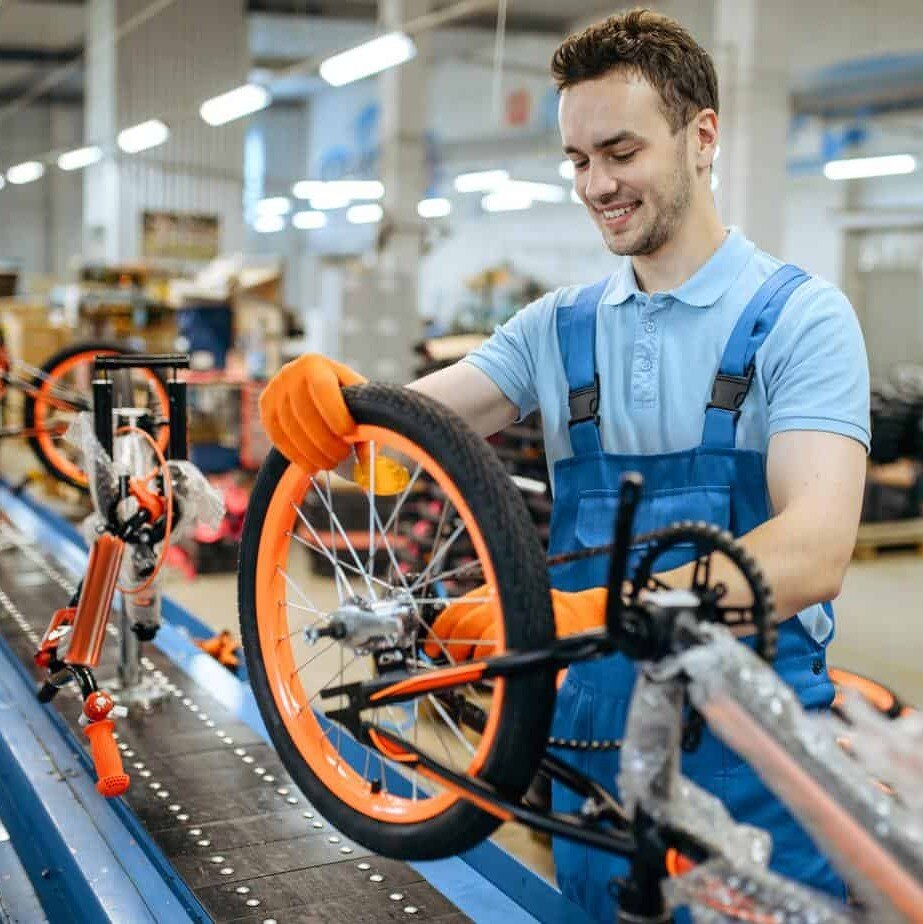 Nazza-bicycle-factory-assembly-line-wheel-installation