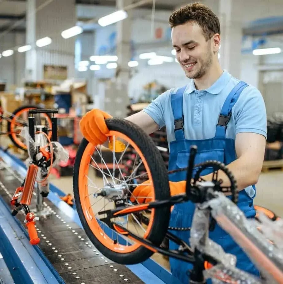 bicycle-factory-assembly-line-wheel-installation